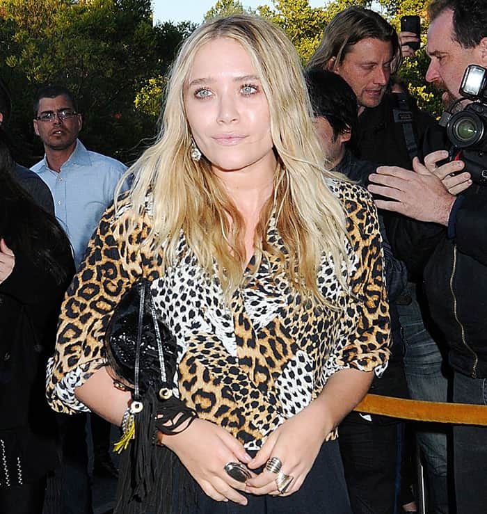 Mary-Kate stepped out in yet another article of clothing with the leopard print