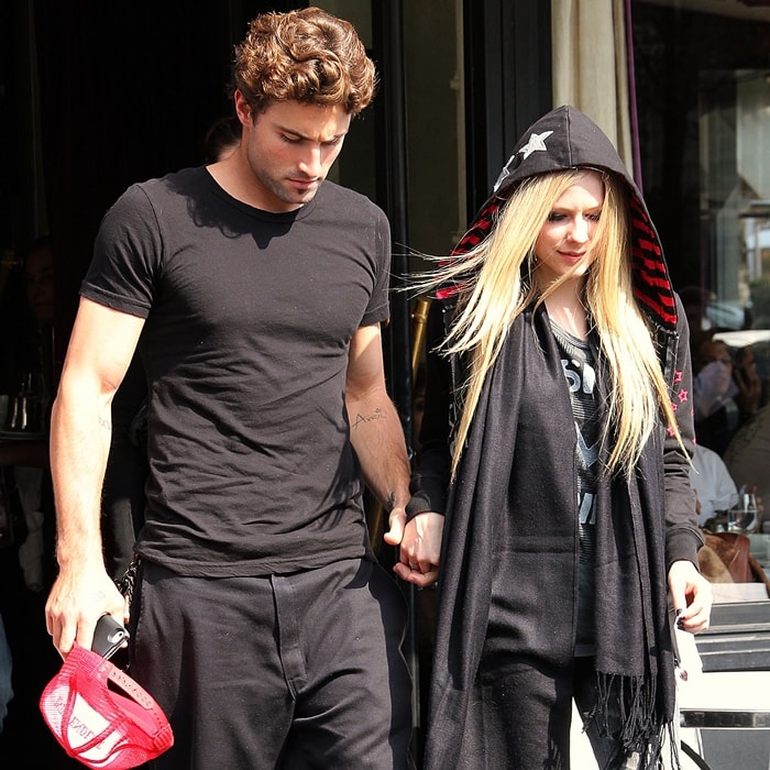Brody Jenner reveals his 'Avril' tattoo on his forearm he leaves L'Avenue restaurant with his girlfriend Avril Lavigne