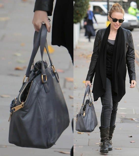 Kylie Minogue wearing black Ray-Ban Wayfarer sunglasses in London