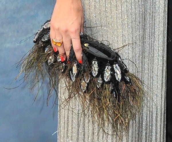 A closer look at Olivia's feather clutch