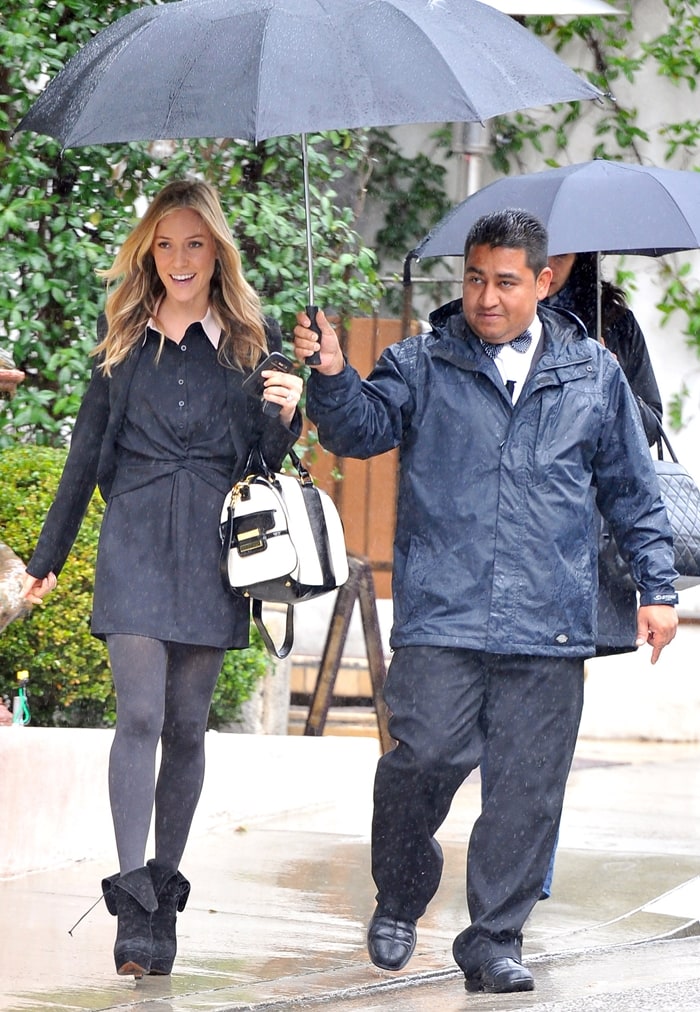 Newly pregnant Kristin Cavallari braves the rain in West Hollywood on January 23, 2012
