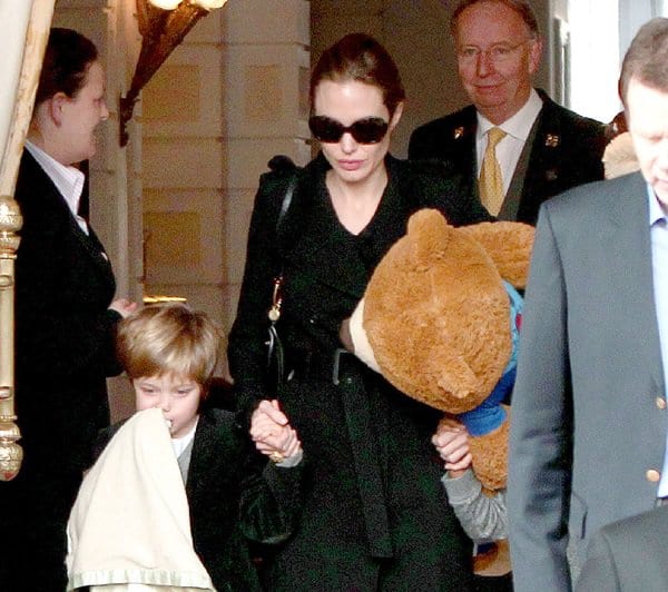 Angelina Jolie toting one of her favorite Dolce & Gabbana handbags