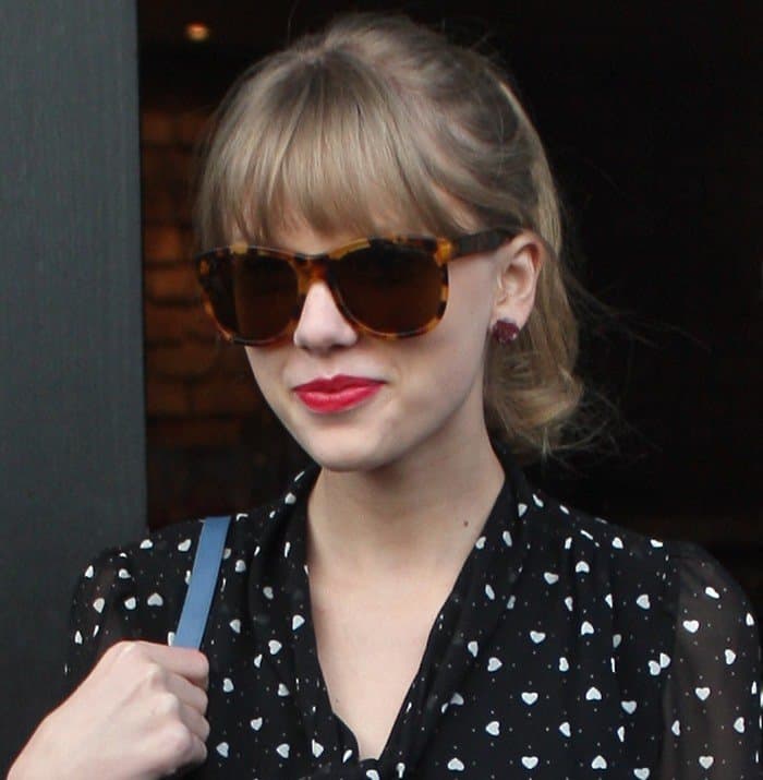 Taylor Swift wearing Ralph Lauren Collection “Ricky” sunglasses