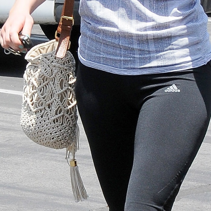 Jennifer Lawrence totes Tory Burche's Claire crocheted bucket bag