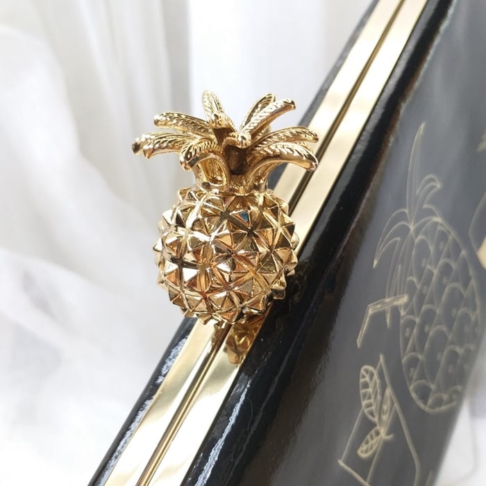 Kate Spade's gold pineapple-shaped clasp