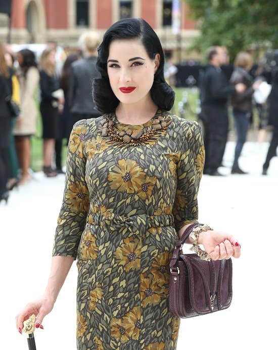 Dita von Teese attends the front row for the Burberry Prorsum show on day 4 of London Fashion Week Spring/Summer 2013