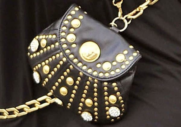 Fergie's gold-trimmed mini crossbody bag