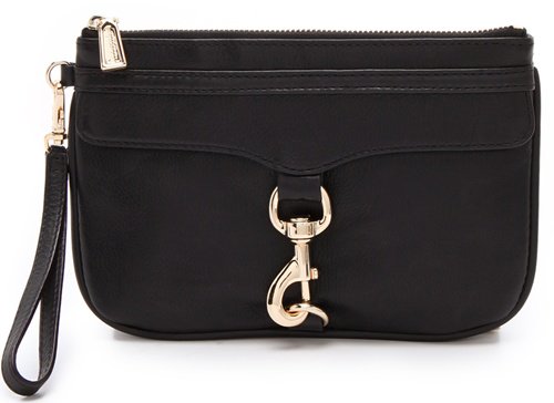 Elegant goldtone hardware accents a compact wristlet crafted from lush pebbled leather