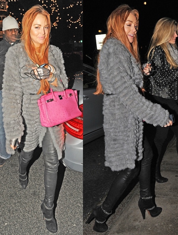 Lindsay Lohan sporting a cute fur coat paired with tight leather pants and black ankle booties