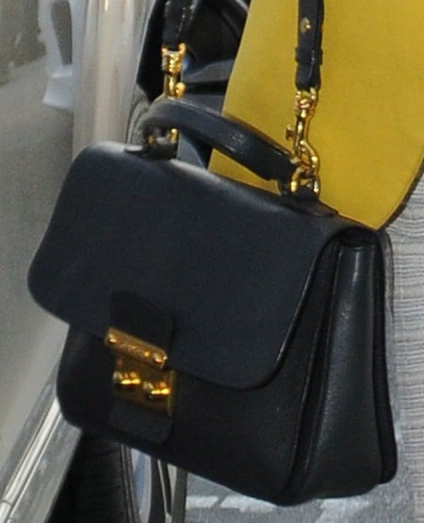 Miranda Kerr's black Miu Miu Madras shoulder bag