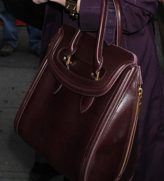 Jessica Chastain's Alexander McQueen 'Heroine' bag, a favorite among celebrities, added a touch of minimalist sophistication with its flap closure and unique side zipper