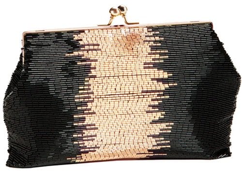 Kinetic beadwork energizes the glam glow of a light-catching clutch furnished with a serpentine strap