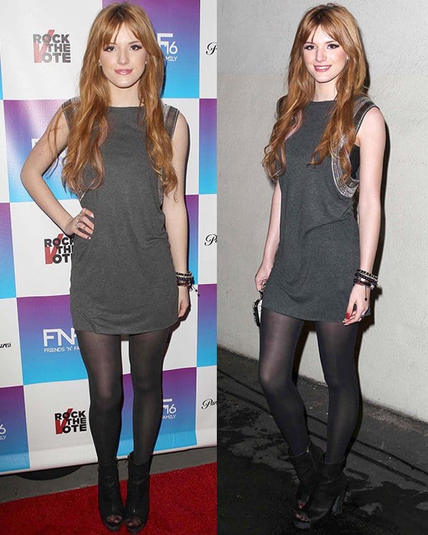 Bella Thorne flaunts her legs in a gray sleeveless dress and black tights