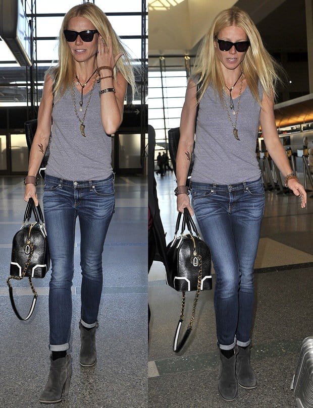 Gwyneth Paltrow carries an Olivia lizard-embossed bag by Alice + Olivia