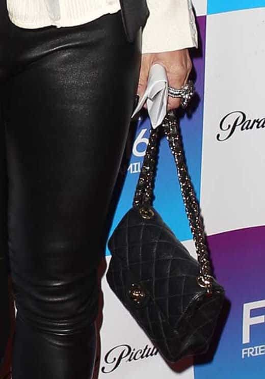 Robin Antin toted a black quilted bag
