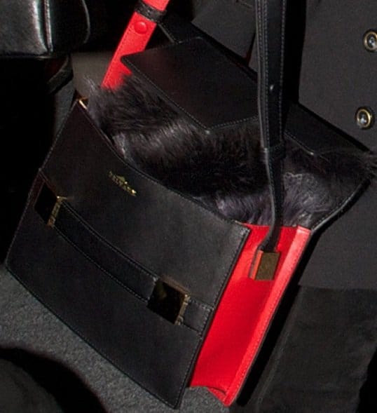 Olivia Palermo wears a structured shoulder bag