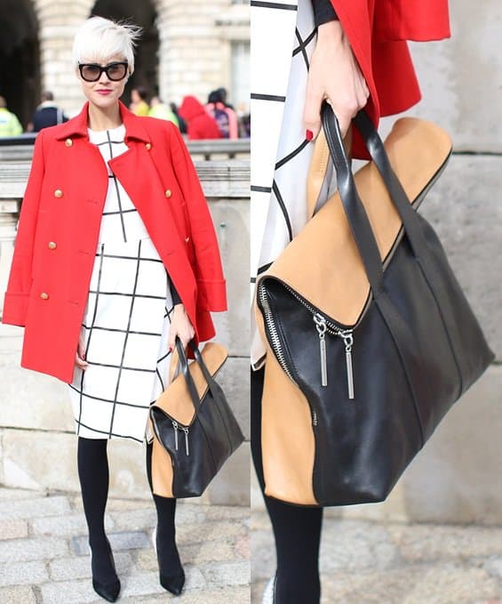 Blonde model carrying a classy bag from 3.1 Phillip Lim