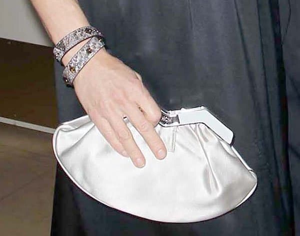 Perrey Reeves toted a silver purse