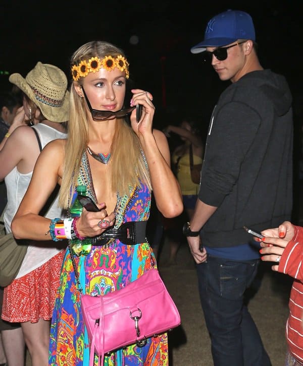 Paris Hilton totes a pink Rebecca Minkoff MAC bag
