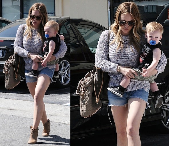 Hilary Duff dared to show off her gorgeous gams with her sweater and cutoff denim shorts combination, which she capped off with a pair of ankle booties and an Alexander Wang 'Diego' bucket bag
