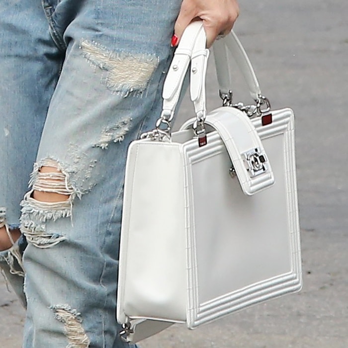 Gwen Stefani carrying a white Boy Chanel purse