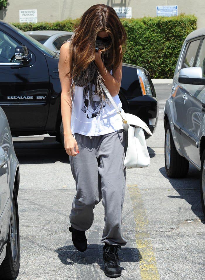 Selena Gomez carrying Dolce & Gabbana's Miss Sicily bag in white