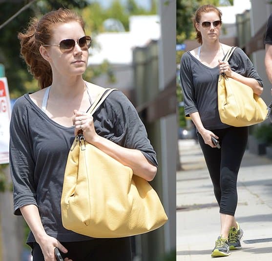Amy Adams carrying a pretty yellow bag as she left a gym with her fiance, Darren Le Gallo (not in picture), in Los Angeles on June 7, 2013