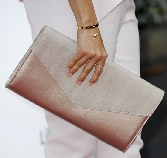 Eva Longoria toting a tonal oversized envelope clutch
