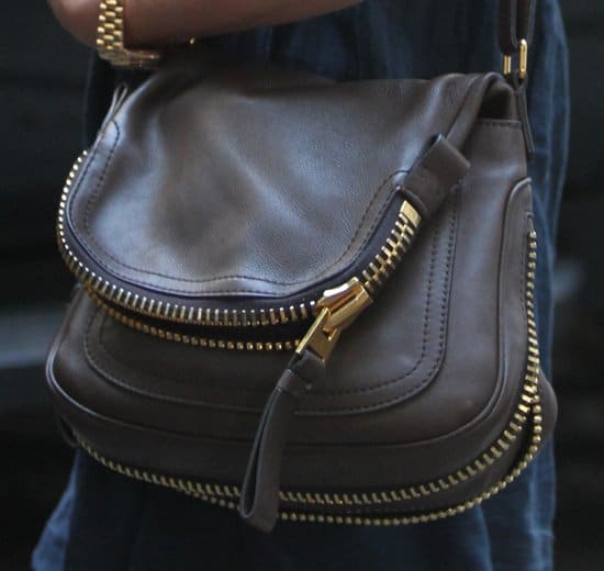 Jennifer Aniston totes Tom Ford's black Jennifer flap over zip bag