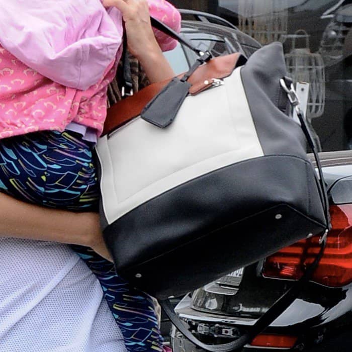A closeup of Jessica Alba's Diane von Furstenberg color-blocked handbag