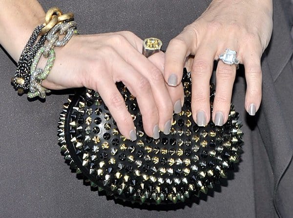 Kate Hudson carrying a studded 'Mina' clutch from Christian Louboutin