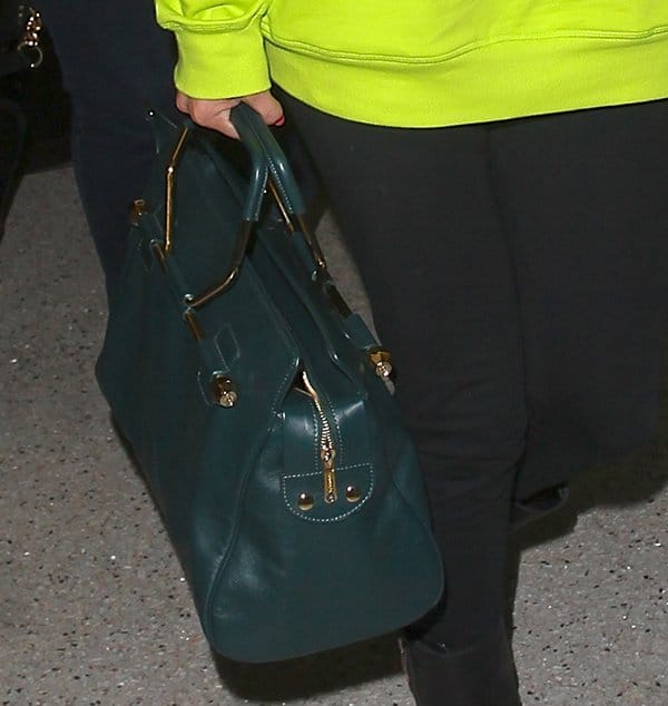 Selena Gomez carrying a Bombette bag by Viktor & Rolf