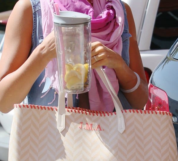 Jessica Alba's tote features the highly popular chevron pattern in a beige and white color mix