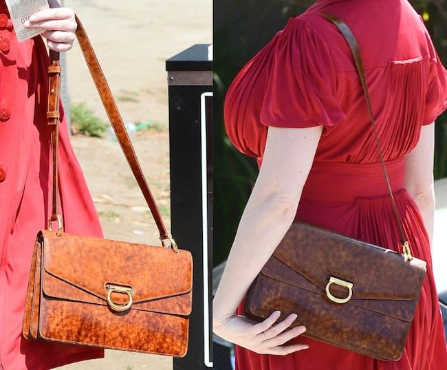 The best part of her whole outfit was her rust-colored shoulder bag