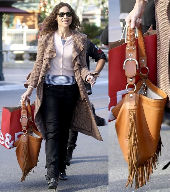 Minnie Driver smiling as she leaves Crate and Barrel after shopping in West Hollywood Los Angeles, California, on November 30, 2010