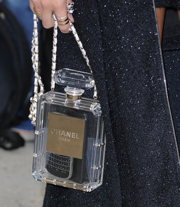 Miroslava Duma punctuated her outfit with the covetable Chanel clutch fashioned like the brand’s legendary Chanel No. 5 perfume