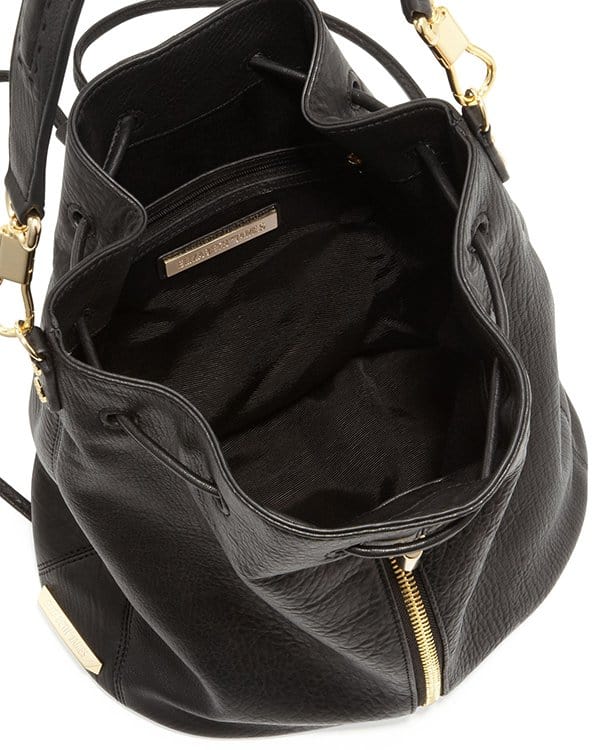 Richly textured lambskin leather shapes a convertible drawstring handbag that exemplifies chic versatility