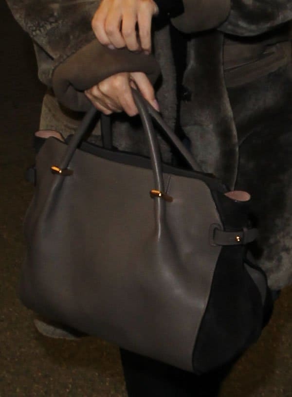 Kylie Minogue carrying Nina Ricci's Marche tote bag