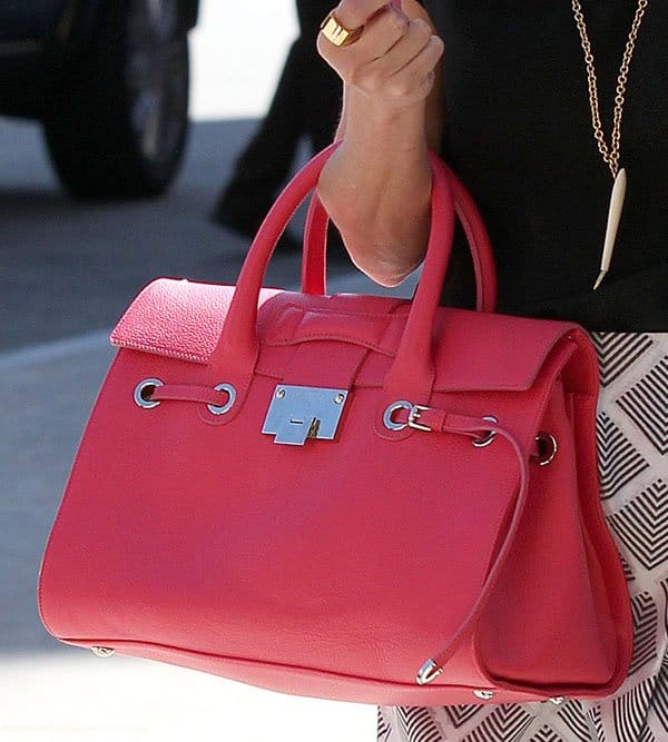 Reese Witherspoon's “Rosalie” satchel is made of pebbled leather and is designed with a structured silhouette