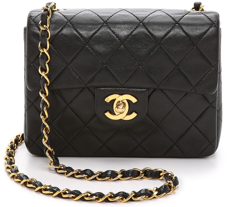 Made from soft, quilted leather, this petite-sized Chanel bag features a leather-woven chain strap