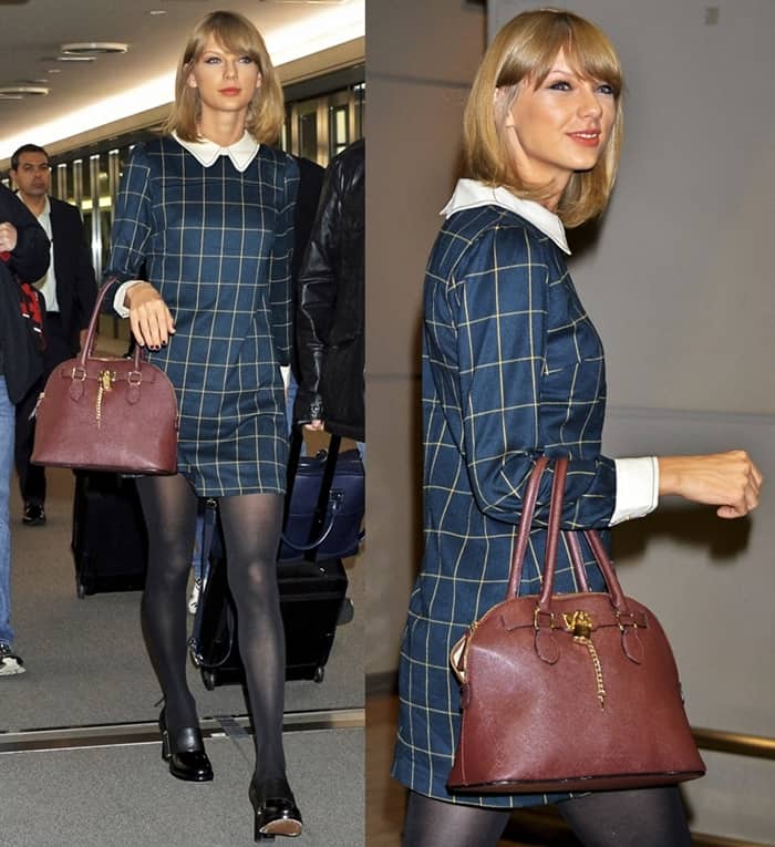 Taylor Swift arrives in a vintage checked Miss Patina dress at the Narita International Airport in Chiba