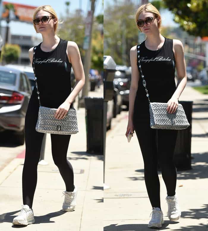 Elle Fanning spotted walking around Los Angeles wearing a "Vengeful Bitches" shirt with a Miu Miu bag.