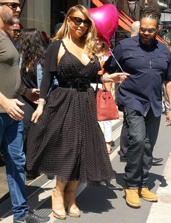 Mariah Carey spotted leaving the Plaza Athénée Hotel in Paris with her bodyguards.