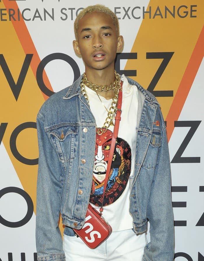 Jaden Smith carrying a Supreme bag at the Louis Vuitton exhibition opening.