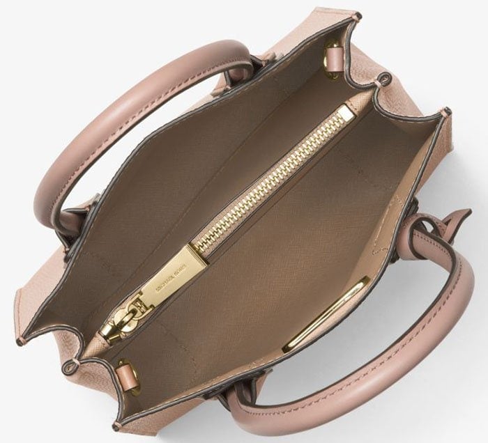 An original Michael Kors bag should have the handles joined to the body using sturdy hardware
