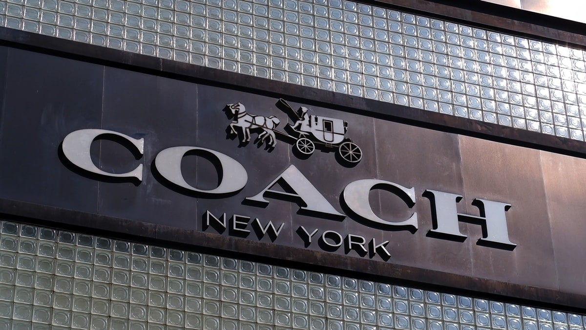 Created by sportswear pioneer Bonnie Cashin in 1962, Coach's iconic logo features an image of a horse and carriage with the company name beneath the image