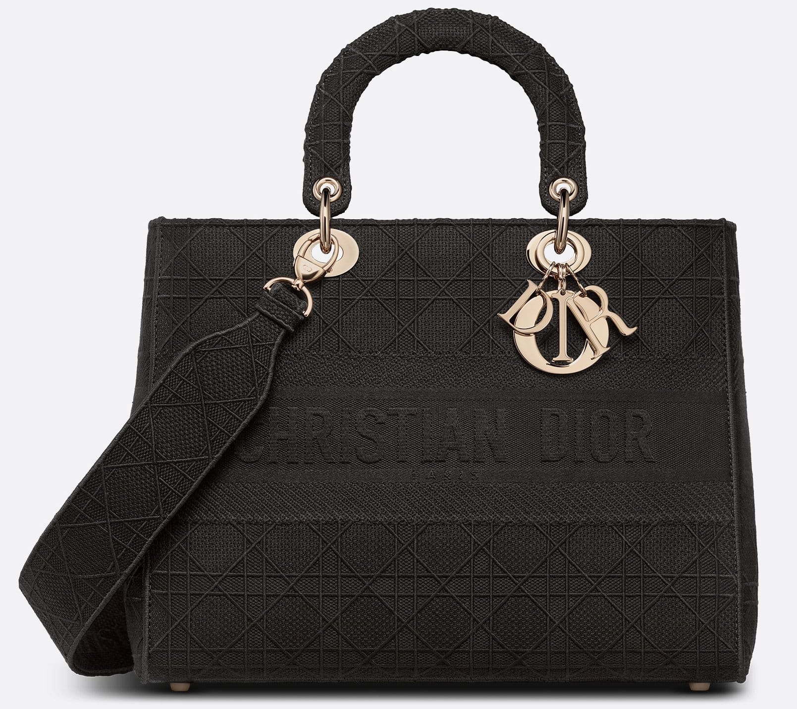 Combining classic elegance with modernity, the Lady D-Lite bag is fully embroidered with a black Cannage motif and has a Christian Dior embroidery across the front