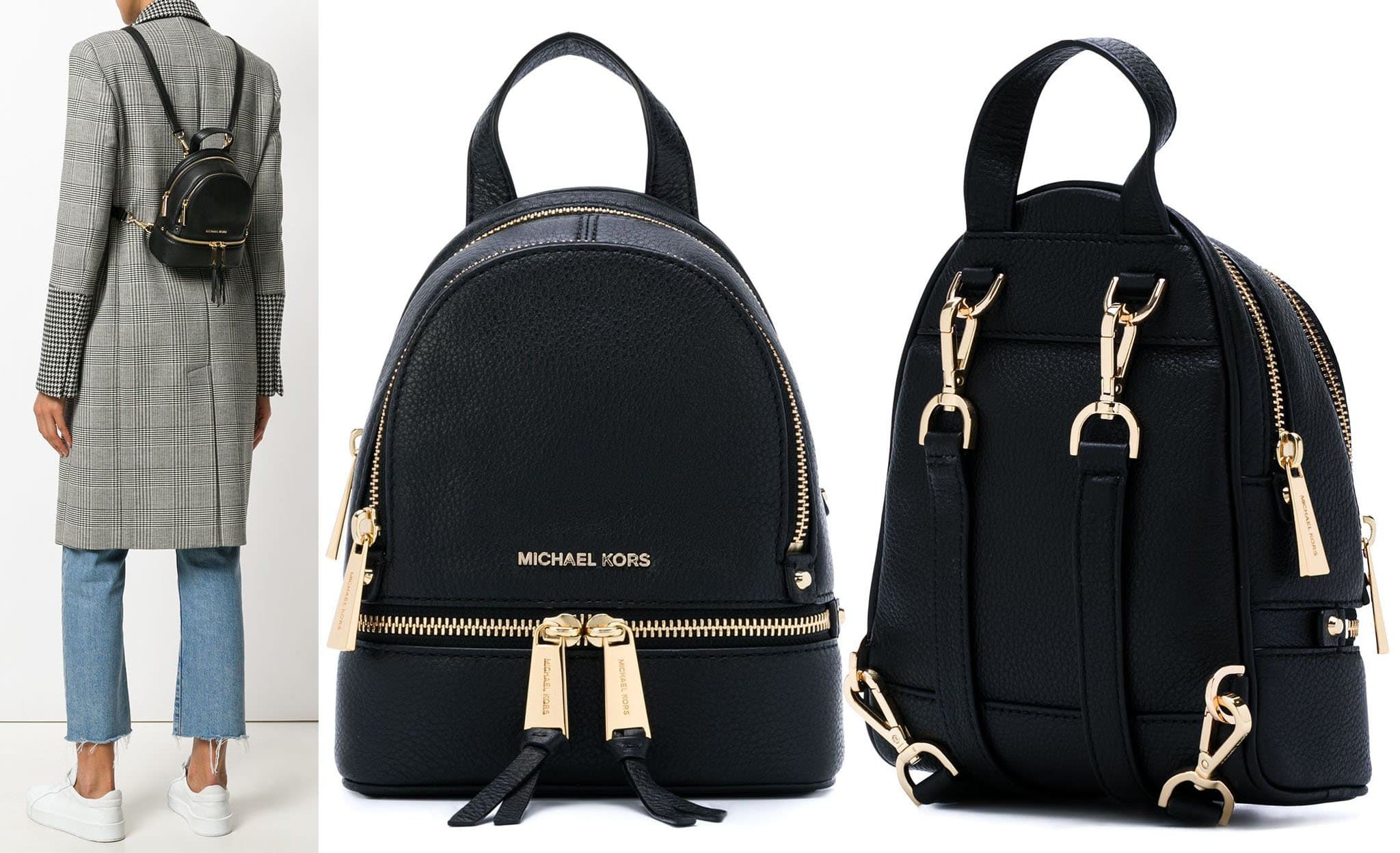 Michael Kors' Rhea is a versatile, multi-functional mini backpack with a streamlined silhouette that you can carry by the top handle or the adjustable shoulder straps