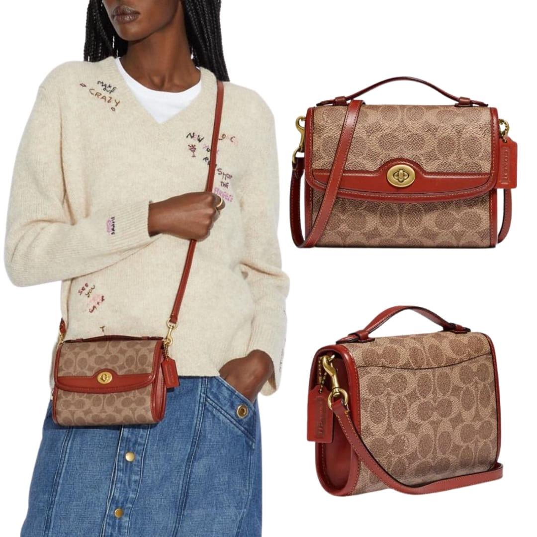 Crafted of Coach's easily recognizable canvas and refined leather, carry the versatile bag by the top handle or wear crossbody with the detachable strap